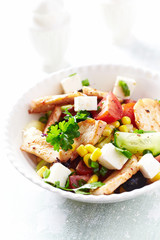 Healthy Salad with Chicken Briest, Feta Cheese, Blcak Olives, Cucumber, Red Pepper and Sweet Corn.