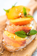 Peach ricotta toast