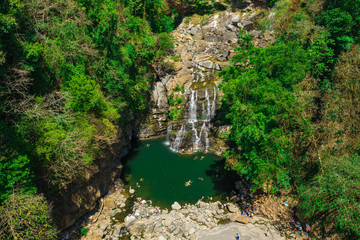Aerial Drone view of waterfall Nauyaca in Costa Rica surrounded by the tropical rainforest