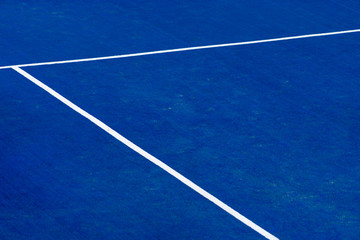 Blue paddle tennis court field with white lines background