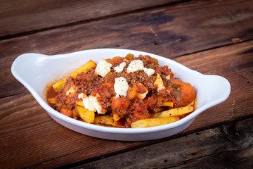 Italian poutine with baked parsnip fries