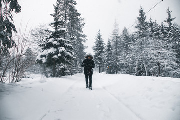 Walking In The Snow While Looking At His Camera, Switzerland.