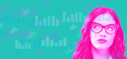 Digital graphs and hexagon grids with young businesswoman in a thoughtful face
