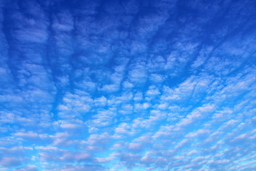 Beautiful blue sky and white cirrus clouds. Background. Scenery.