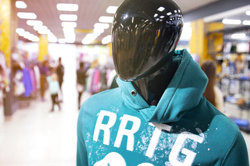 Mannequin dressed in Hoodie. Sale and seasonal change of collection. Led lighting on the ceiling....