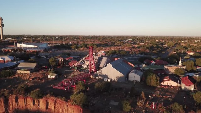 4K high quality sunny sunrise morning aerial panorama footage of spectacular scenic The Big Hole old diamond mine site, mine shaft towers in Kimberley, capital of Northern Cape province, South Africa