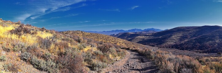 Hiking Trails in Oquirrh, Wasatch, Rocky Mountains in Utah Late Fall with leaves. Backpacking, biking, horseback through trees in the Yellow Fork and Rose Canyon by Salt Lake City. United States of Am