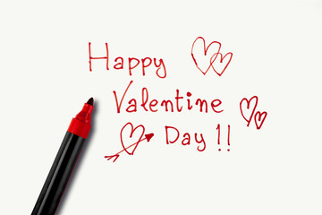 Valentine's Day phrase made with a red marker on a white background. Concept of St. Valentine's Day