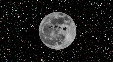 Santa in front of moon