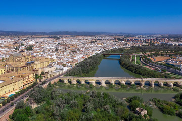 Aerial view of the old city of Cordoba and Romano Bridge. Spain