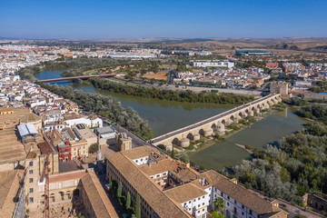 Fototapeta na wymiar Aerial view of the old city of Cordoba and Romano Bridge. Spain