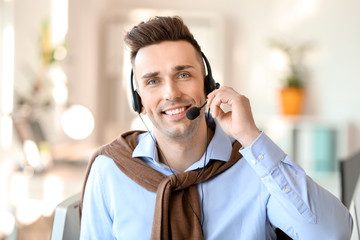 Male technical support agent in office