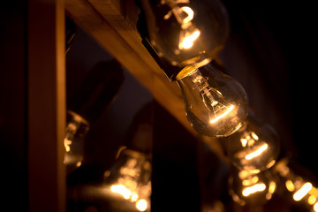 Edison background with dim bulb