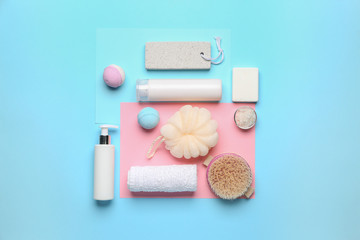 Set of bath accessories on color background