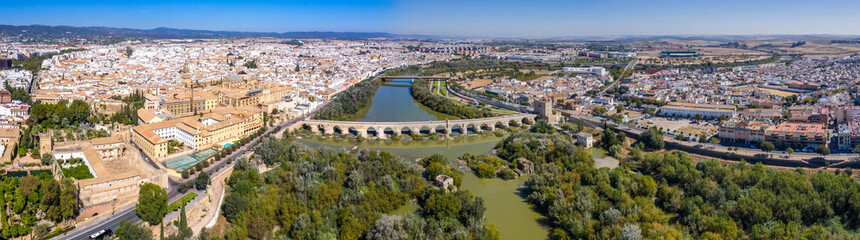 Fototapeta na wymiar Panoramic aerial view of the Romano Bridge and the old town of Cordoba. Spain