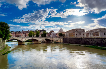 Obraz premium A view along the Tiber River towards St. Peter's Basilica in Rome, Italy.