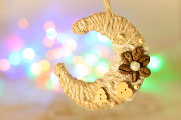 Handmade month decoration with blurry background of colored lights, romantic atmosphere.