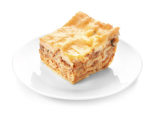 Plate with prepared lasagna on white background