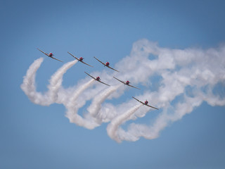 Skywriters and smoke trails