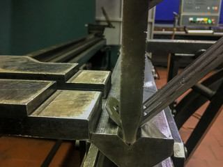 Sheet metal bending in factory by bending mashine.
