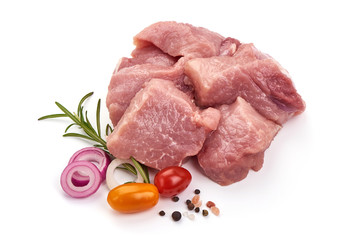 Raw pork pieces, isolated on white background
