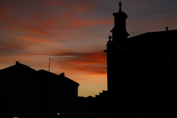 Silhouette of a religious temple at dusk
