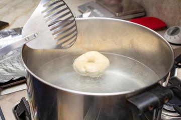 Process of making homemade bagels, boing them in the pan