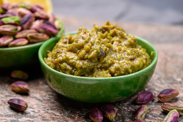Pistachio pesto sauce made from high quality green pistachio nuts growing on slopes of Mount Etna in Bronte, Sicily, Italy
