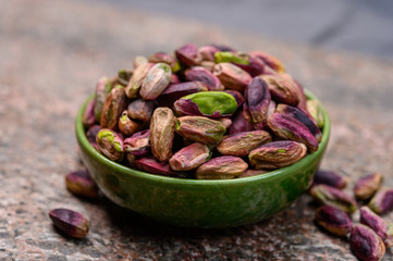 High quality green pistachio nuts growing on slopes of Mount Etna in Bronte, Sicily, Italy