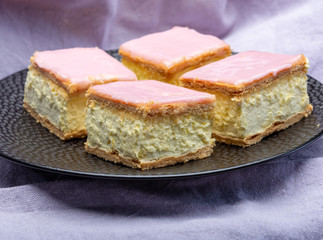 Tompoes or tompouce, iconic pastry in Netherlands and Belgium made from puff dough, icing, cream