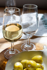 Sherry wine tasting, dry fino, manzanilla or palomino jerez fortified wine in glasses, Jerez de la Frontera, Andalusia, Spain