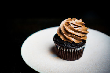 Chocolate cupcake with chocolate frosting