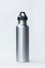 A stainless steel vacuum cup, sports cup, outdoor travel cup isolated on a white background.