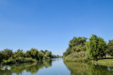 Fototapeta na wymiar Poltava Yerik. Landscape river, water and trees.