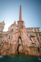 Fototapeta na wymiar Navona Square (Piazza Navona) with the Fountain of the Four Rivers and The Sant'Agnese in Agone Church in the background, Rome, Italy