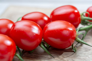 Vine of fresh ripe red cherry prunella tomates