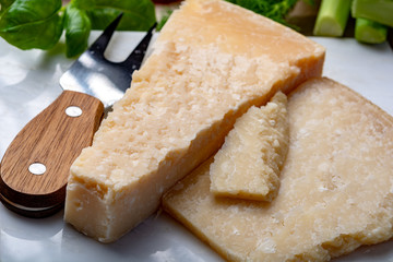 Original italian cheese, aged Parmesan cow milk cheese, pieces of Parmigiano-Reggiano