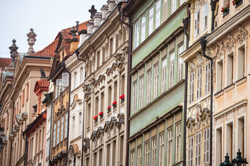 Fototapeta premium Typical Medieval Facade of an old appartment residential building in a street of old town, the historical center of Prague, Czech Republic, in the most touristic part of the city