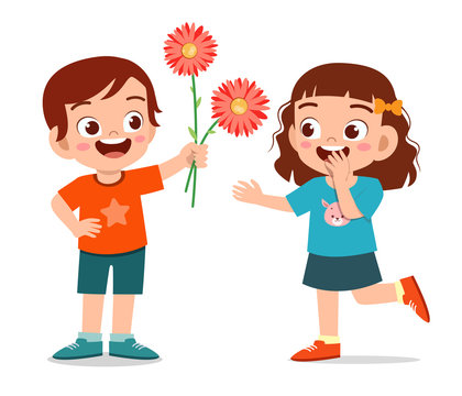 happy cute kid boy give flower to friend