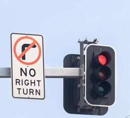 red light sign , Road sign , Red sign for cars with stop sign at headlight and turn right signpost.