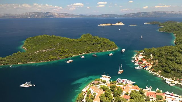 Aerial view of islands and boats docked in ocean of Mljet National Park, Croatia
