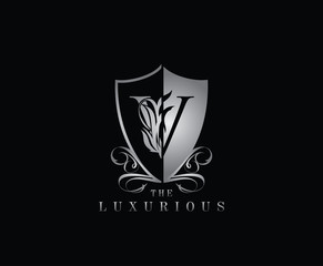 Luxury Guard V Letter Logo Icon. Silver V With Classy Shield Shape design perfect for fashion, Jewelry, Beauty Salon, Cosmetics, Spa, Hotel and Restaurant Logo. 