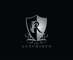 Luxury Guard R Letter Logo Icon. Silver R With Classy Shield Shape design perfect for fashion, Jewelry, Beauty Salon, Cosmetics, Spa, Hotel and Restaurant Logo. 