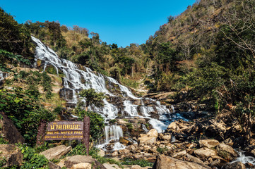 Mae ya waterfall with Thai and English label 