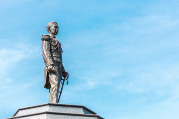 Naklejka premium Krommaluang Chumphon Monument against the blue sky and clouds. The Father of our Thai Navy (Prince of Chumphon).