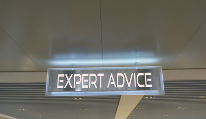 EXPERT ADVICE text written on shiny signboard