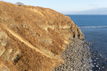 Sea landscape with coastline on Russian island.
