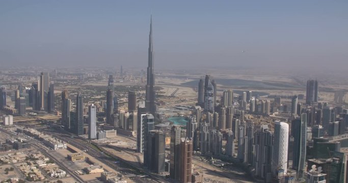 DUBAI, UAE - JANUARY 2, 2017: Aerial view of Burj Khalifa downtown Dubai at sunrise. The Burj al Khalifa is the tallest structure in the world, standing at 829.8 m (2,722 ft).