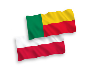 Flags of Benin and Poland on a white background