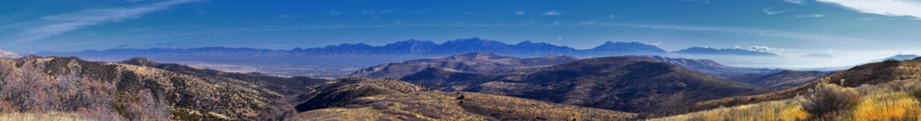 Views of Wasatch Front Rocky Mountains from the Oquirrh Mountains with fall leaves, Hiking in Yellow Fork trail and Rose Canyon in Great Salt Lake Valley. Utah, United States. USA.